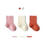 Set of vibrant Pairs of  cotton socks for toddlers.